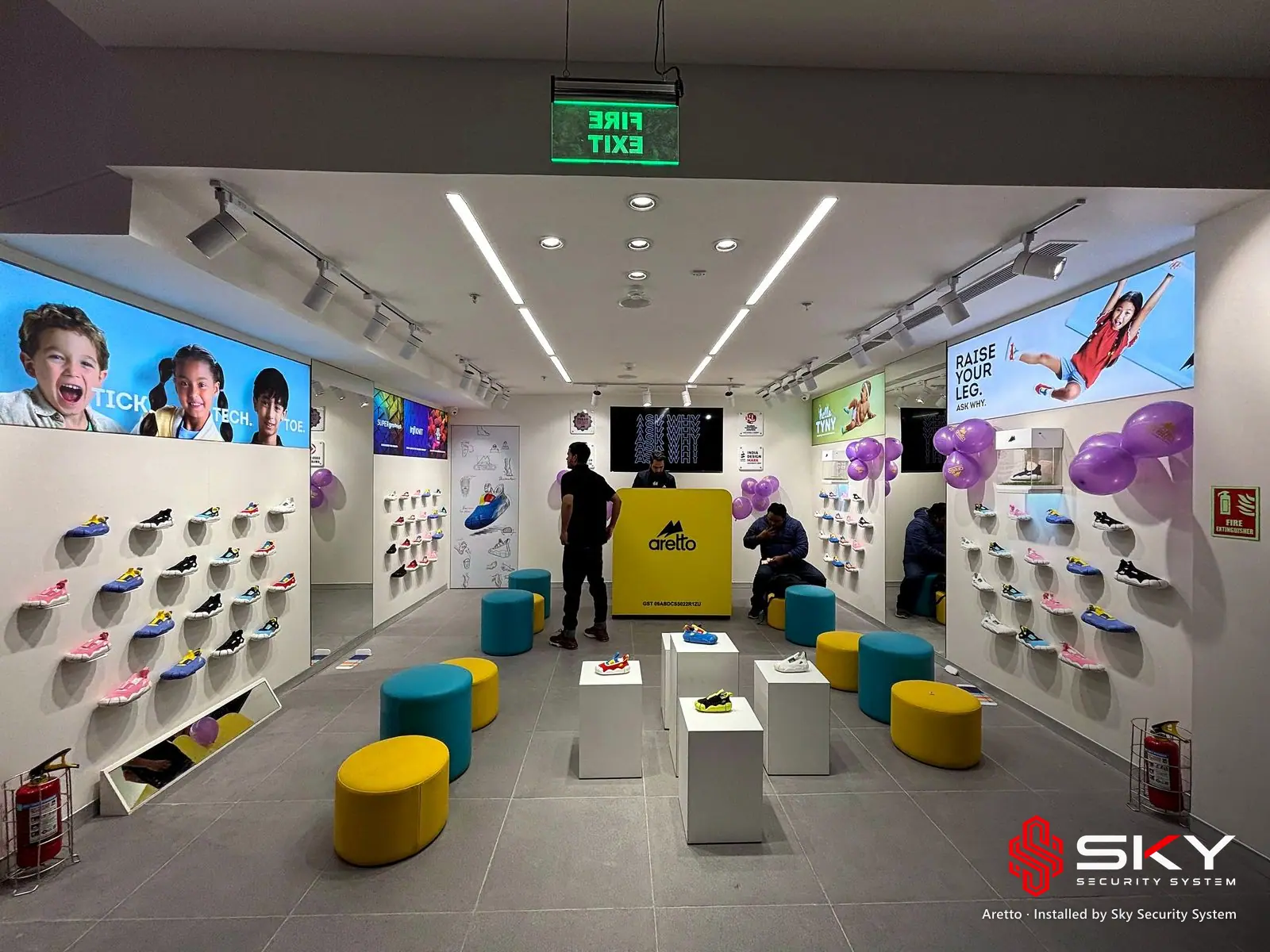 Store floor with ceiling lighting at the Aretto site. Security and ELV work by Sky Security System.