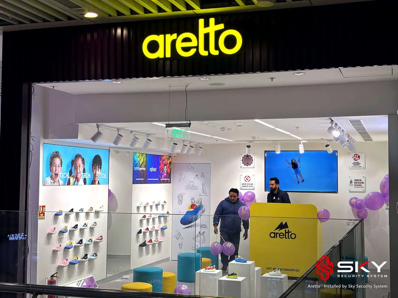 Store front with the Aretto sign at the Aretto site. Security and ELV work by Sky Security System.