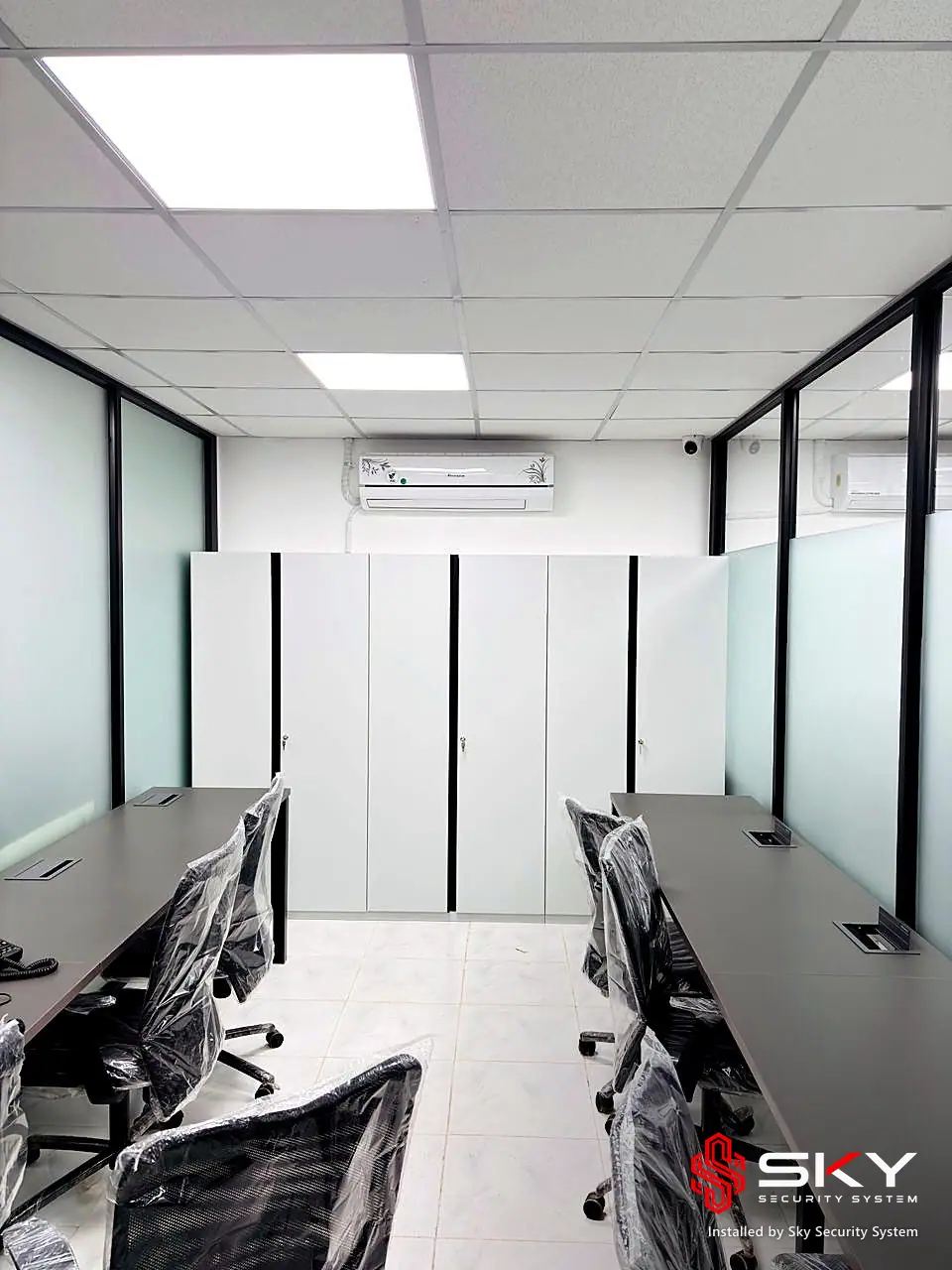 Cabin workspace at a corporate office. Security and ELV work by Sky Security System.