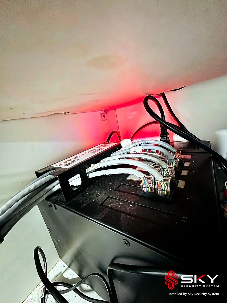 Rack above the ceiling at a corporate office. Security and ELV work by Sky Security System.