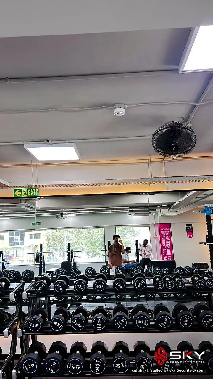 Weights area at the cult.fit site. Security and ELV work by Sky Security System.
