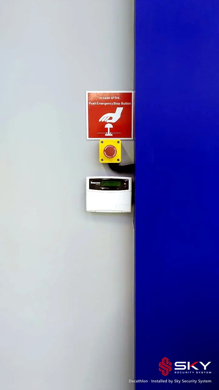 Fire alarm call point and panel at the Decathlon site. Security and ELV work by Sky Security System.