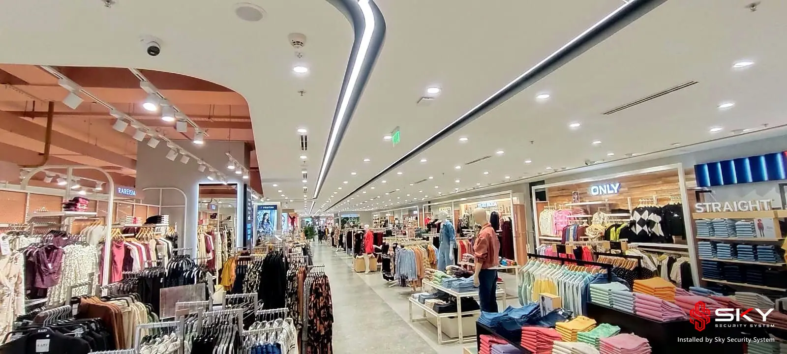 Fashion aisle at a department store. Security and ELV work by Sky Security System.