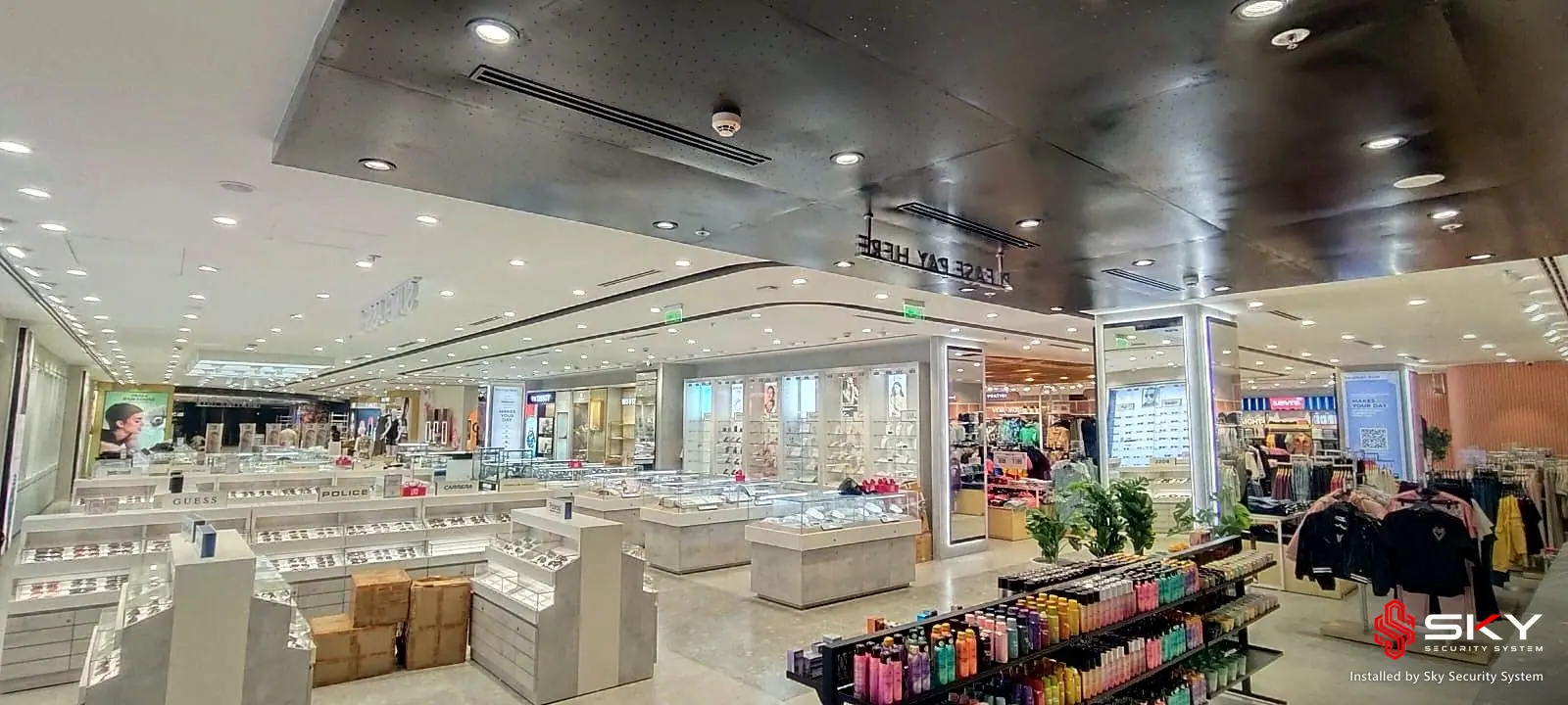 Store floor and ceiling at a department store. Security and ELV work by Sky Security System.