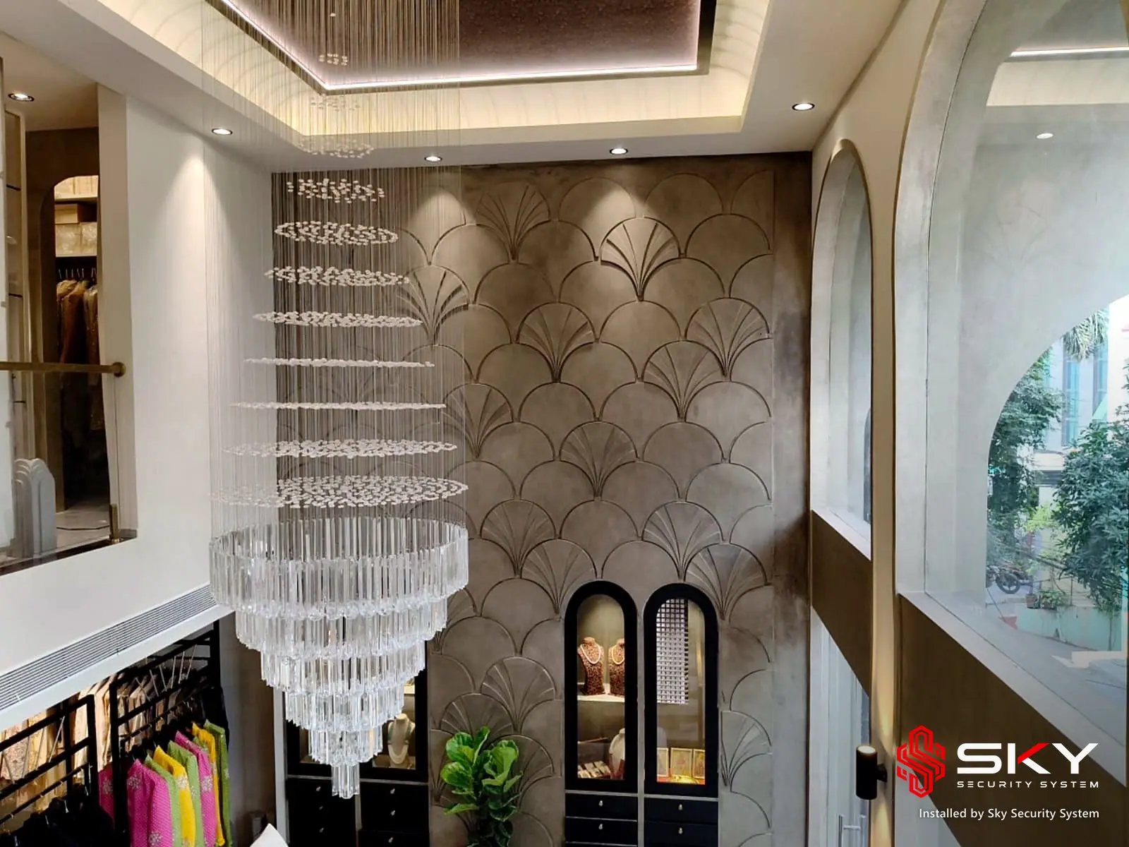 Feature wall and chandelier at a fashion boutique, Hyderabad. Security and ELV work by Sky Security System.