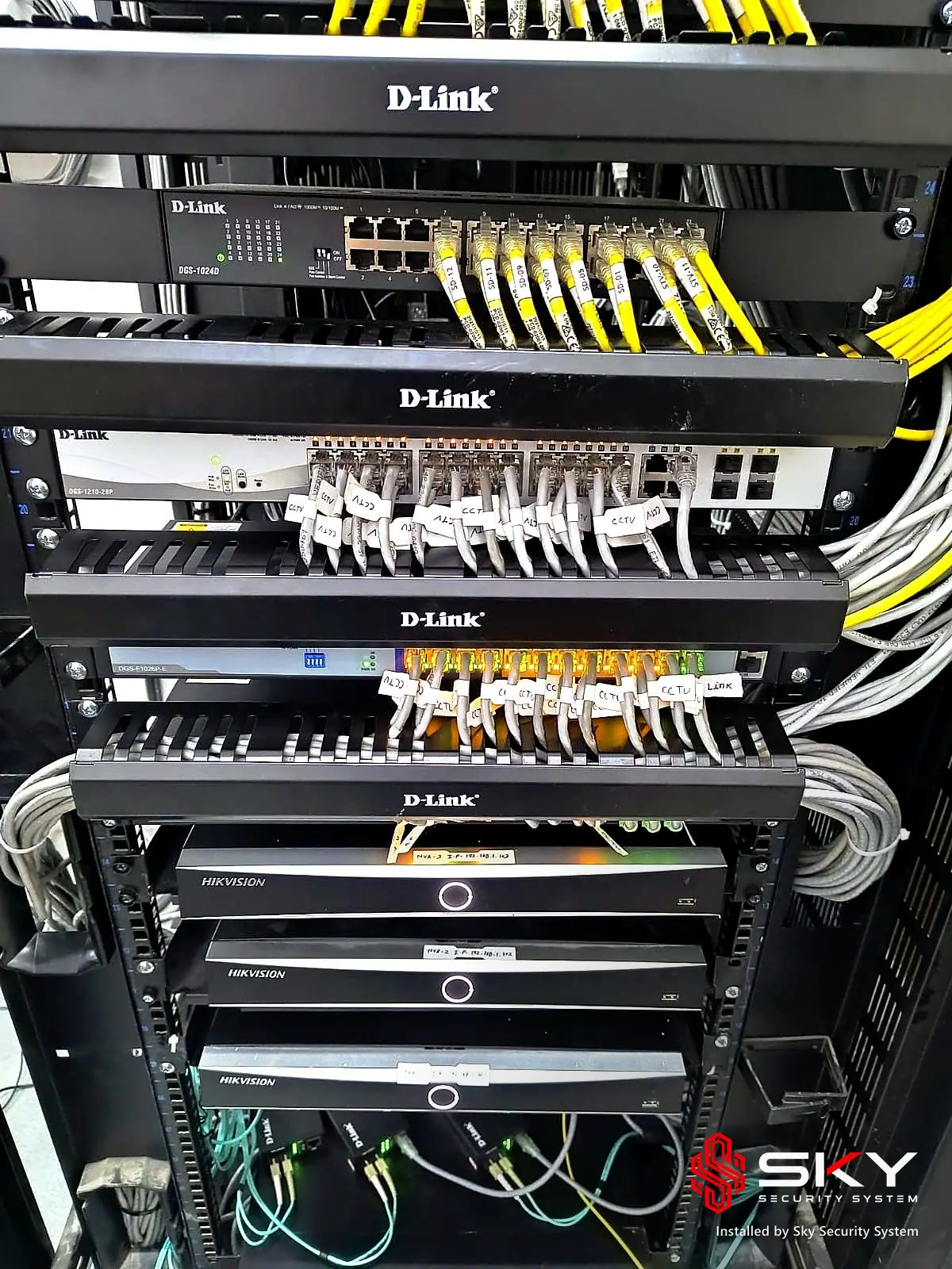Network rack with patch panels and switches at an it office and warehouse. Security and ELV work by Sky Security System.