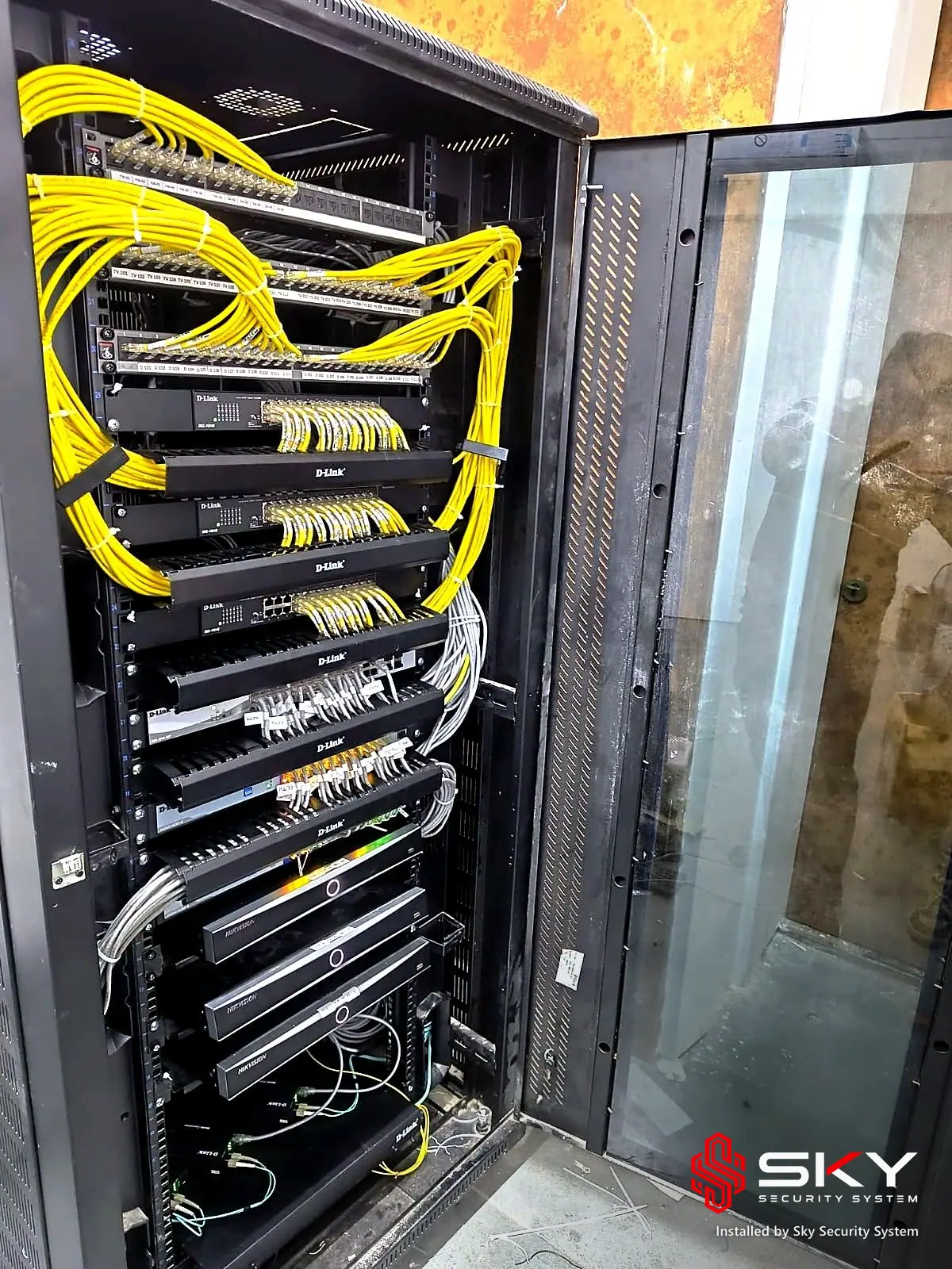 Structured cabling rack at an it office and warehouse. Security and ELV work by Sky Security System.