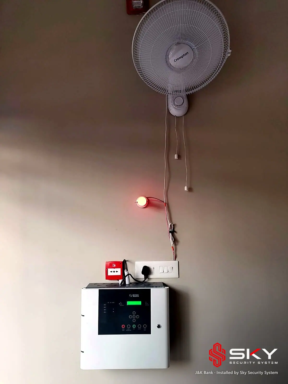 Fire alarm panel with hooter at the J&K Bank site. Security and ELV work by Sky Security System.