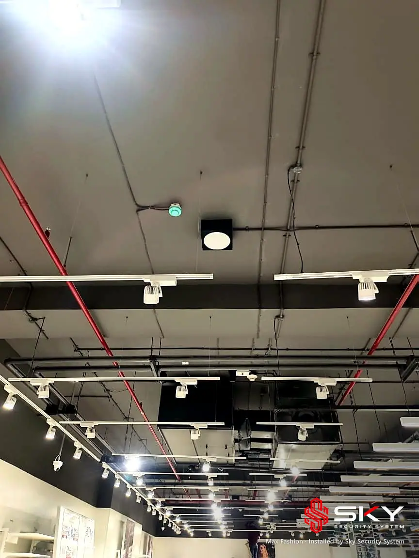 Ceiling devices above the shop floor at the Max Fashion site. Security and ELV work by Sky Security System.