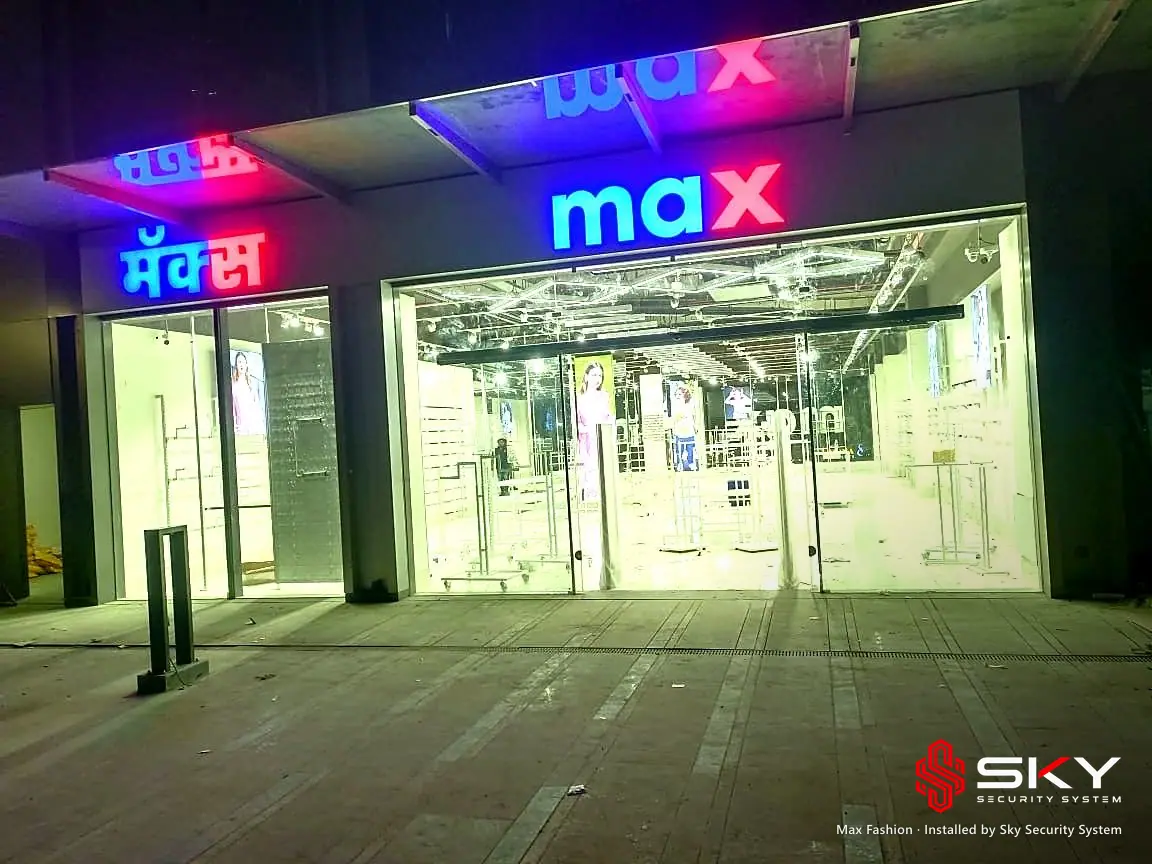 Max store front at night at the Max Fashion site. Security and ELV work by Sky Security System.