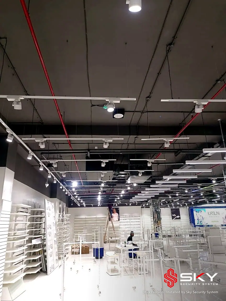 Store floor with an open ceiling at the Max Fashion site. Security and ELV work by Sky Security System.