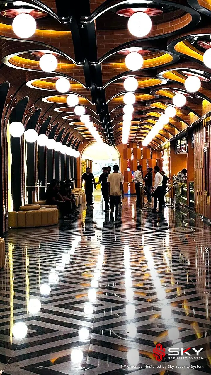 Lobby with patterned floor at the NY Cinemas site, Thane. Security and ELV work by Sky Security System.