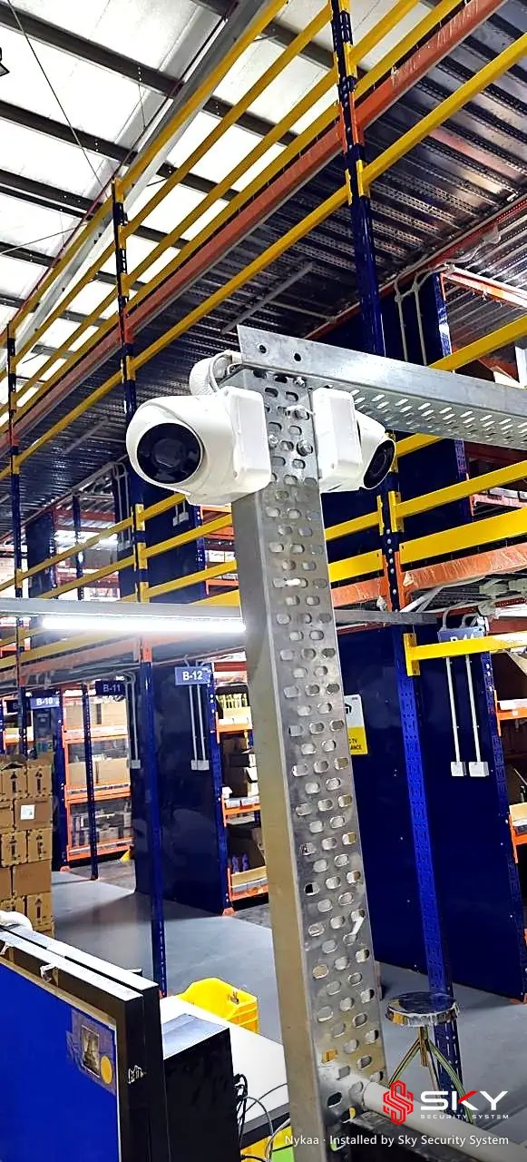 Camera on warehouse racking at the Nykaa site. Security and ELV work by Sky Security System.