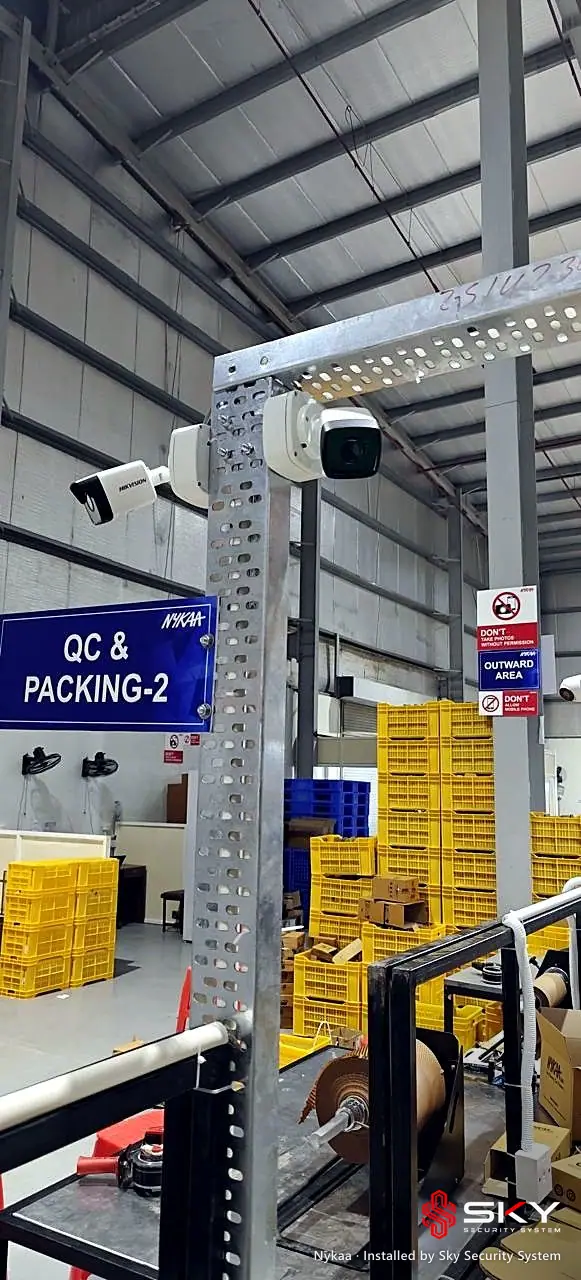 Camera over a packing line at the Nykaa site. Security and ELV work by Sky Security System.