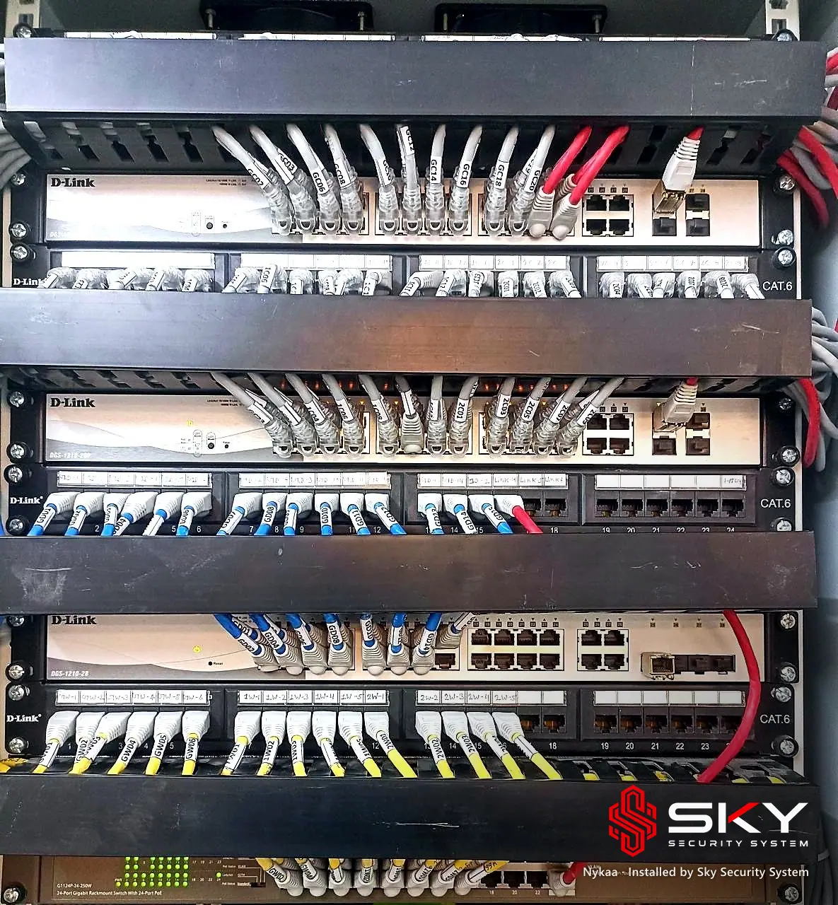Network rack with switches at the Nykaa site. Security and ELV work by Sky Security System.