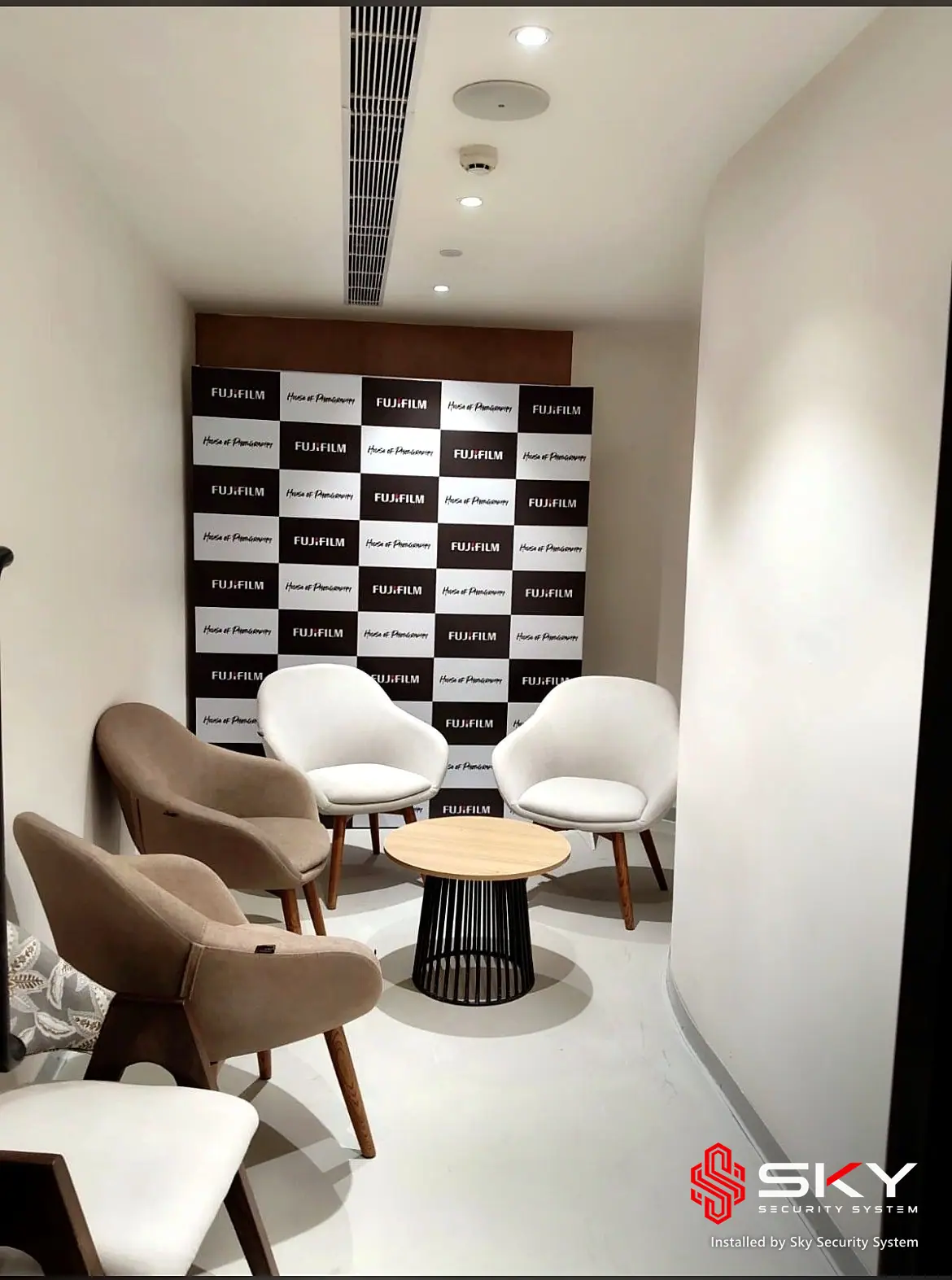 Lounge area at a retail experience centre. Security and ELV work by Sky Security System.