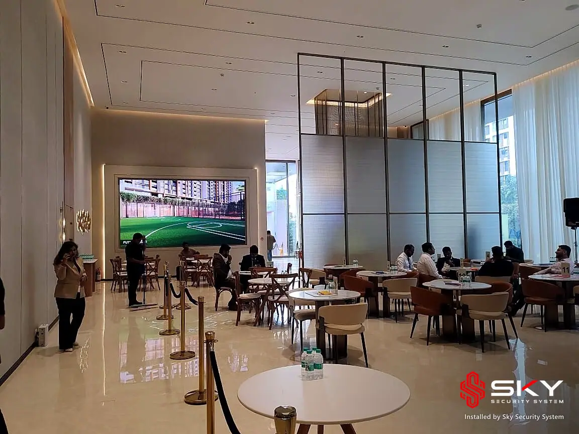 Lounge with video wall at a real estate. Security and ELV work by Sky Security System.