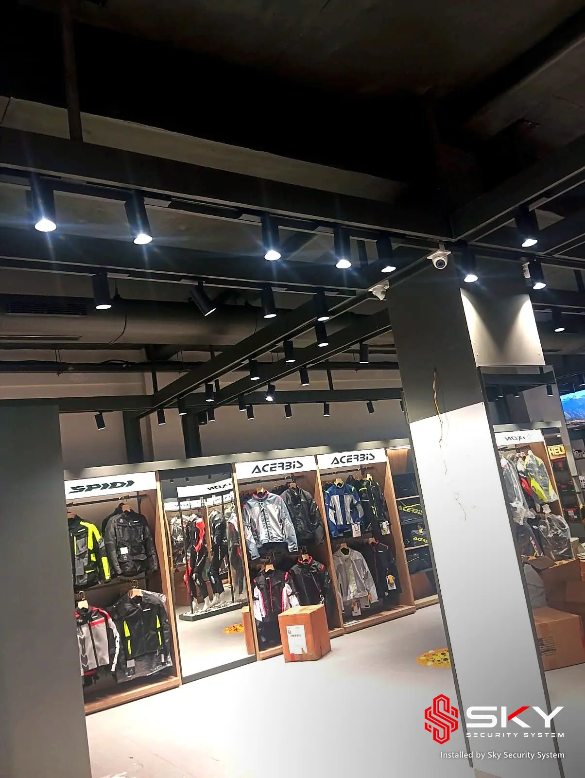 Apparel aisle at an automotive retail. Security and ELV work by Sky Security System.