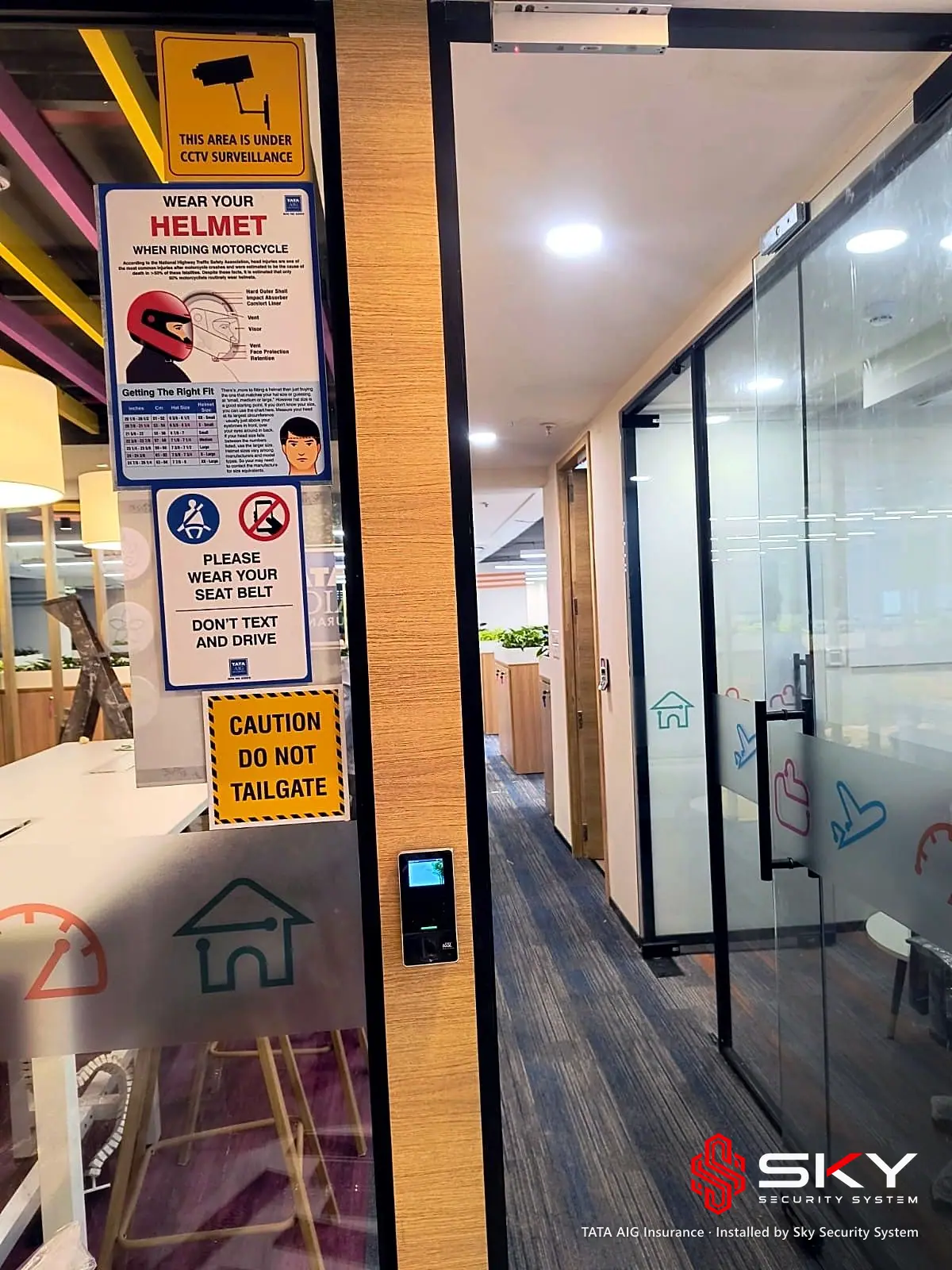 Office door with an access control reader at the TATA AIG Insurance site. Security and ELV work by Sky Security System.