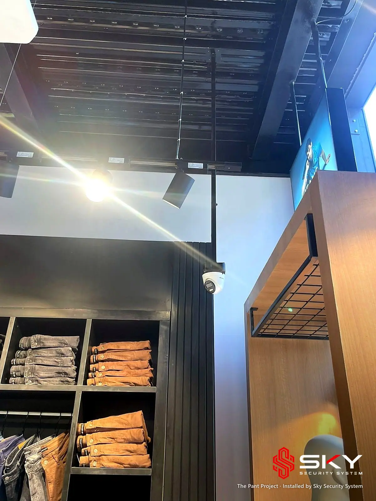 Camera above the shelving at the The Pant Project site. Security and ELV work by Sky Security System.