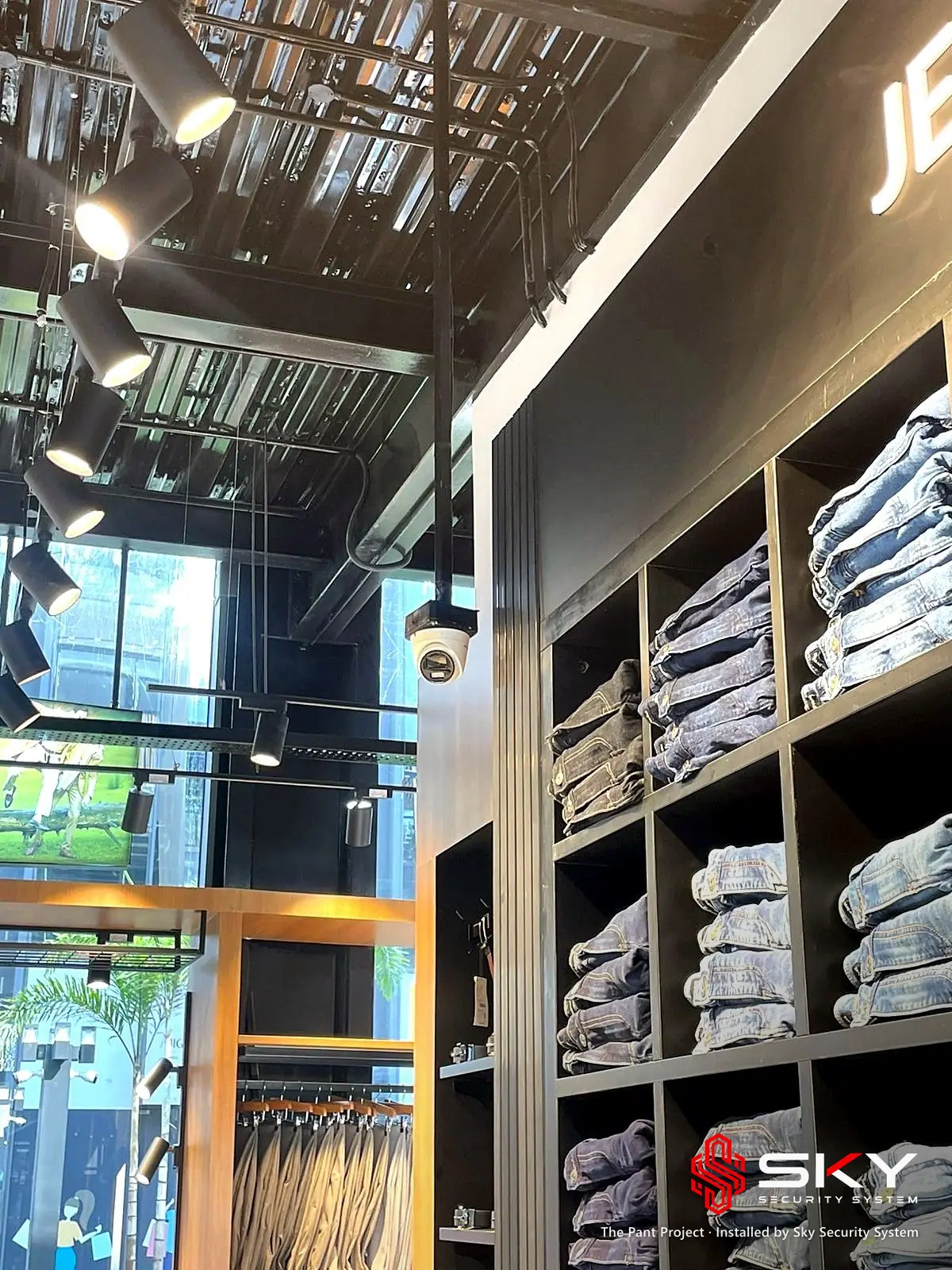 Denim shelving at the The Pant Project site. Security and ELV work by Sky Security System.