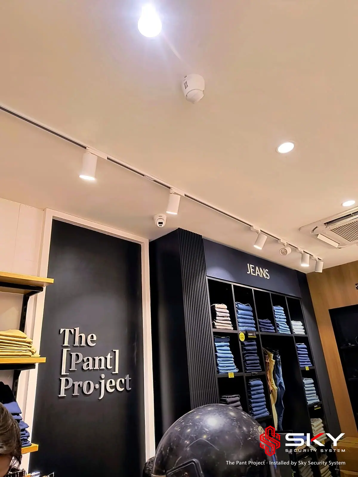Store interior with brand wall at the The Pant Project site. Security and ELV work by Sky Security System.