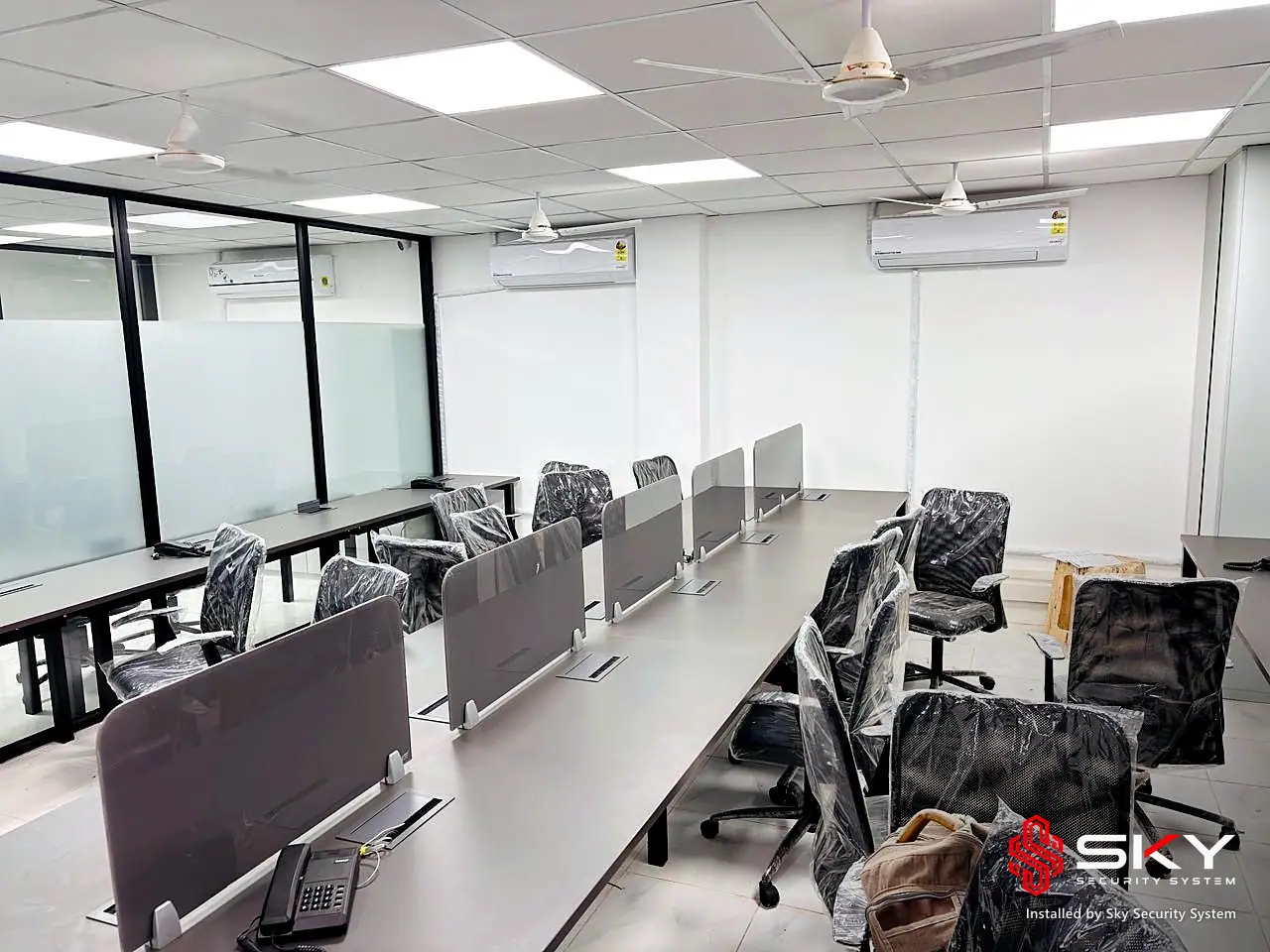 Office workstations at a corporate office. Security and ELV work by Sky Security System.