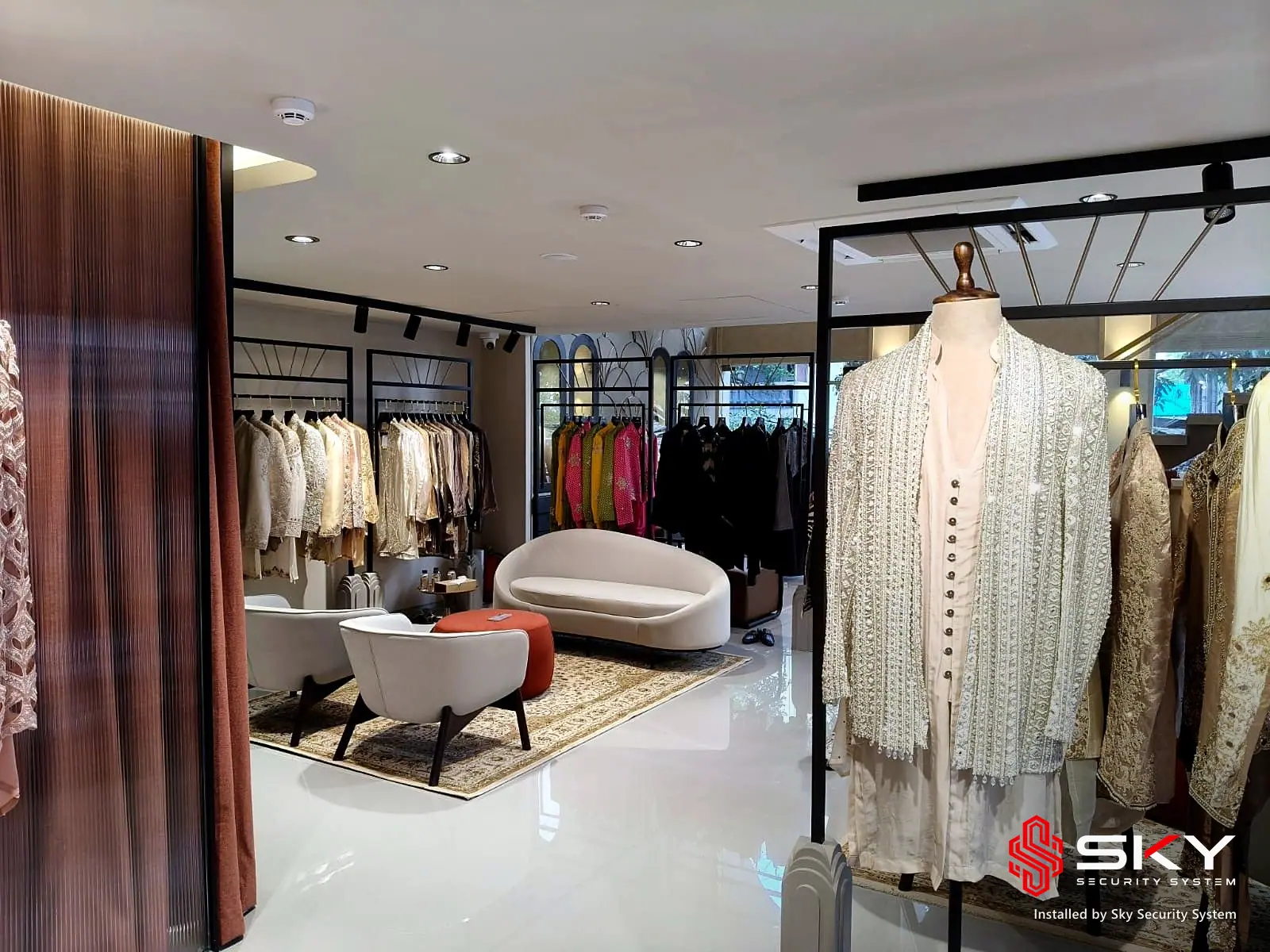Boutique floor with lounge seating at a fashion boutique, Hyderabad. Security and ELV work by Sky Security System.